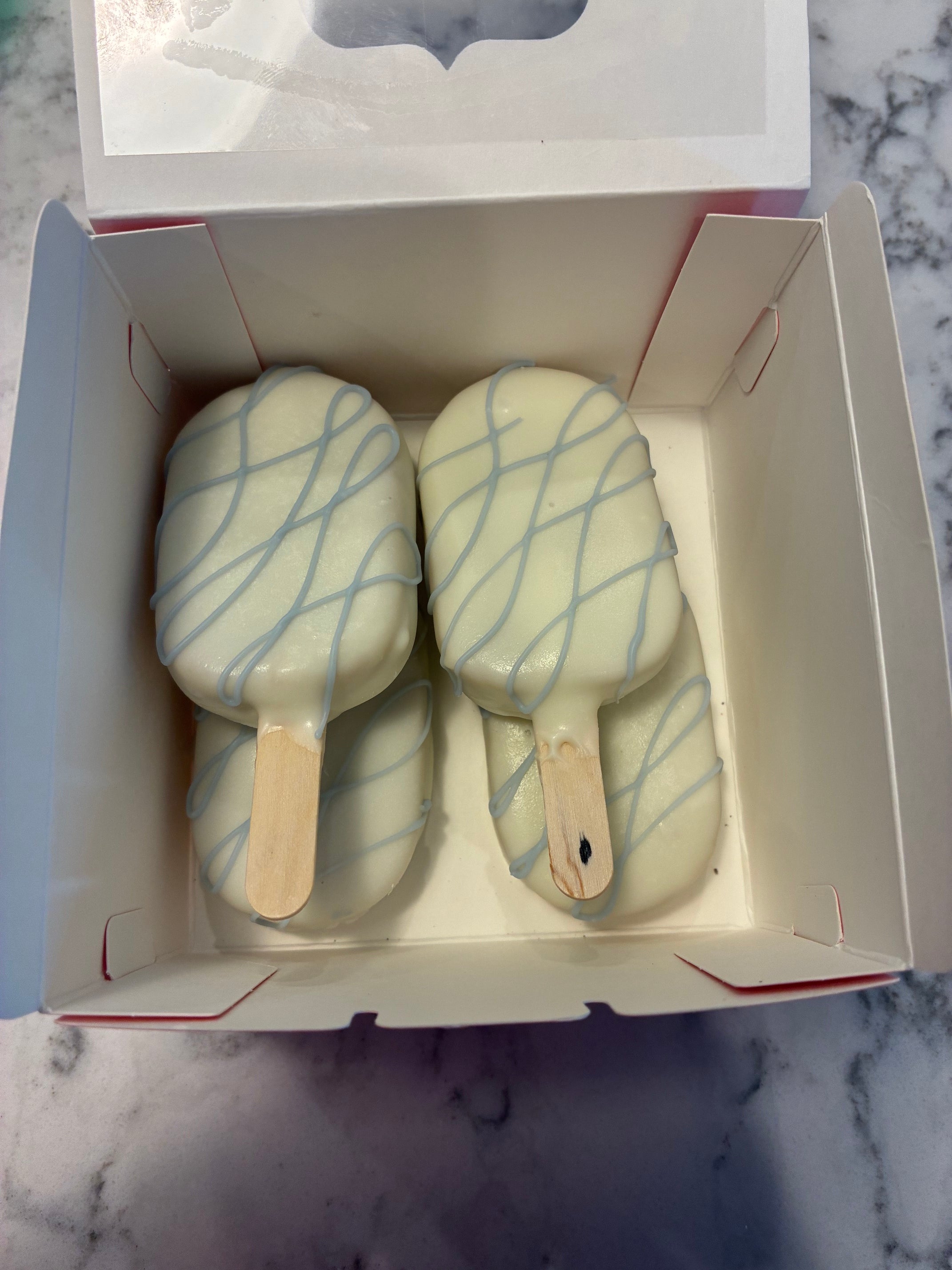 Cake Pops hand dipped in vanilla candy coating infinity loop design choose 2 colors. (Copy)